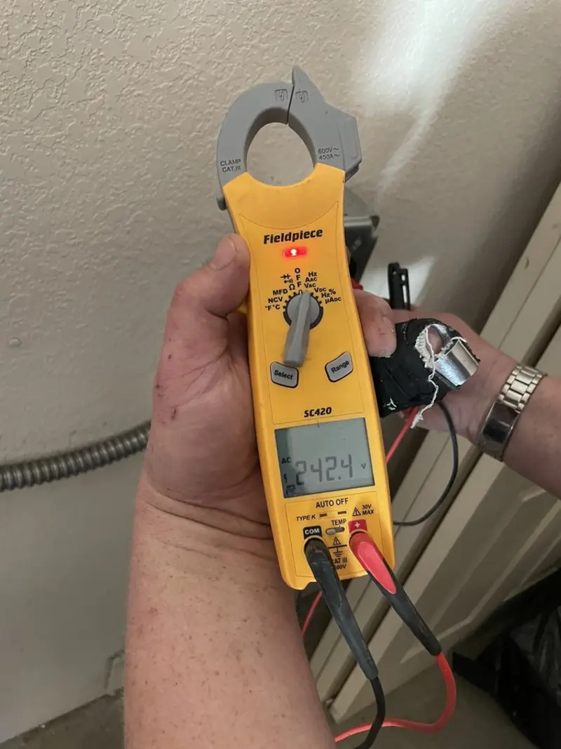 Voltage testing with clamp meter during Generator Installation in Williamsville
